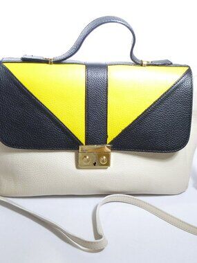 New off white, black and yellow pebbled Italian leather handbag